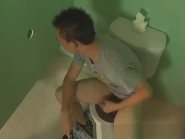 Twink blowing two cocks at the gloryhole for that jizz