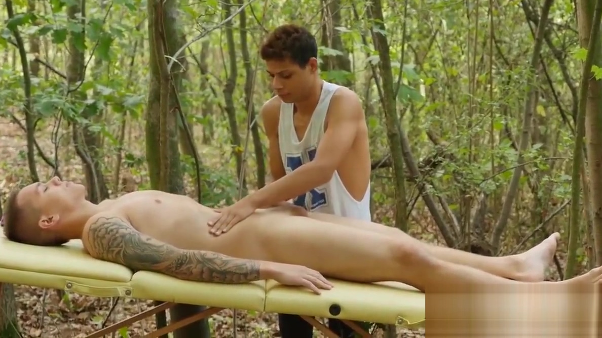 Marion Anel rides Jerome Fisher on massage table outdoors