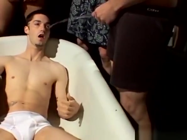 Cock sucking twink enjoys his personal golden shower orgy