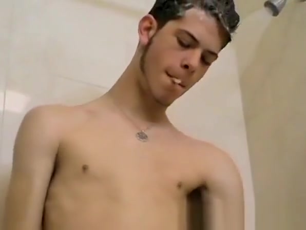 Skinny gay Bleu jerking off while smoking in the shower