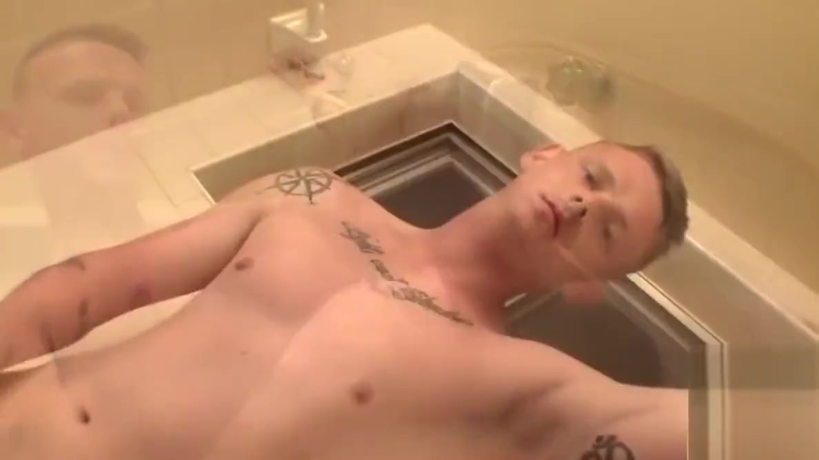 Young man Dallas Cage shoots jizz after stroking in shower
