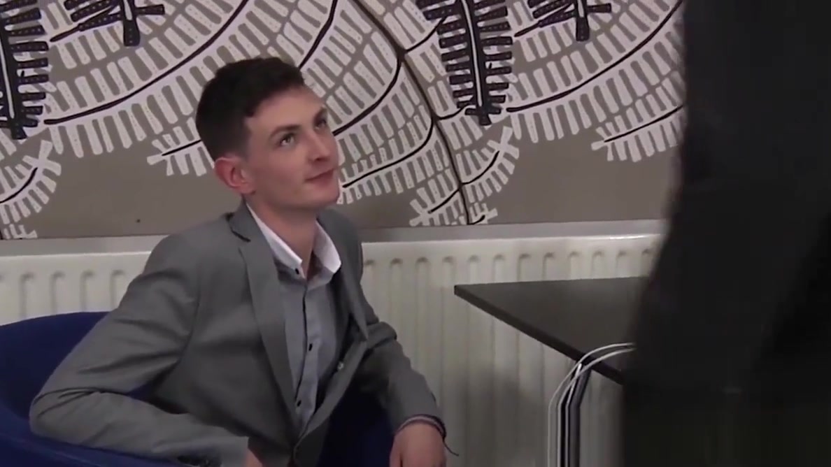 Successful young businessmen banging at the office