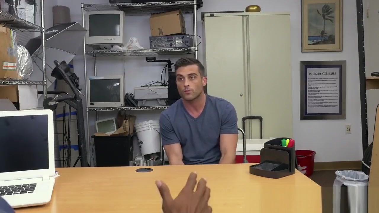 White stud takes long black cock anally in office