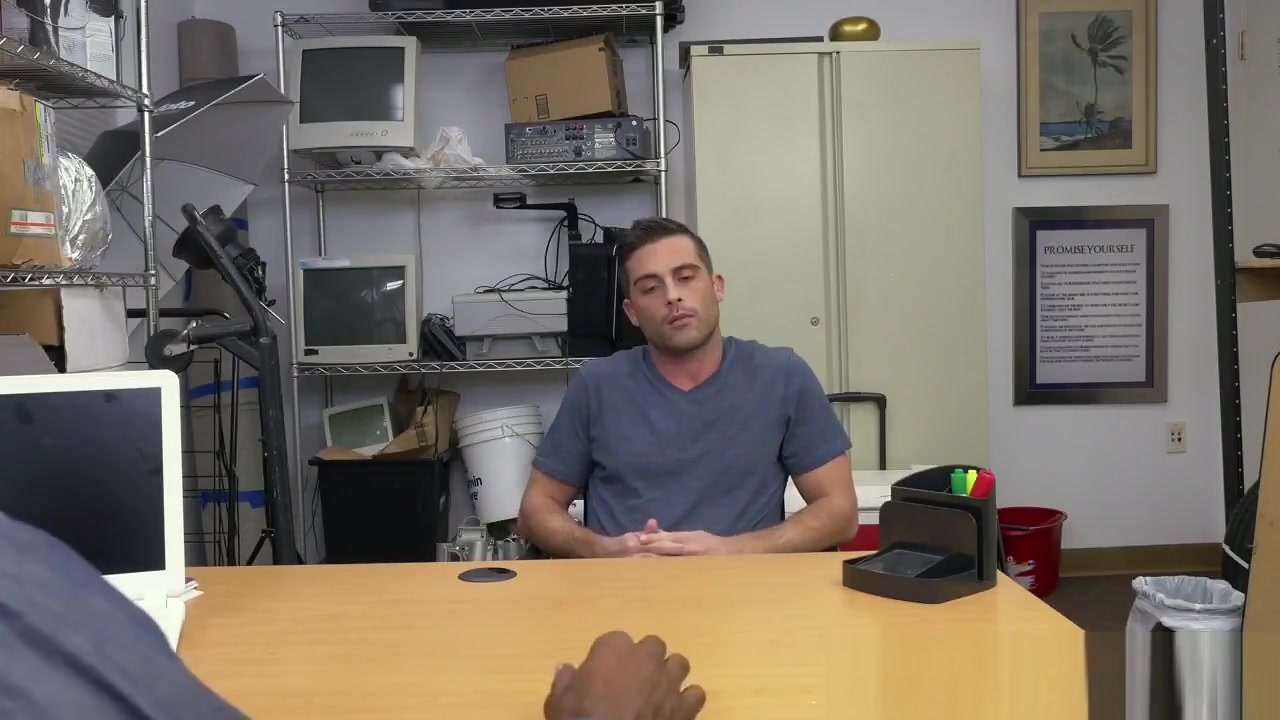 White stud takes long black cock anally in office