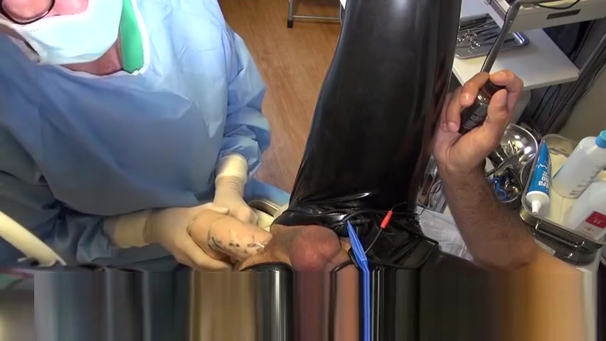 Doctor Fists and Sounds Latex Slave with Gloves in Gyno Chair