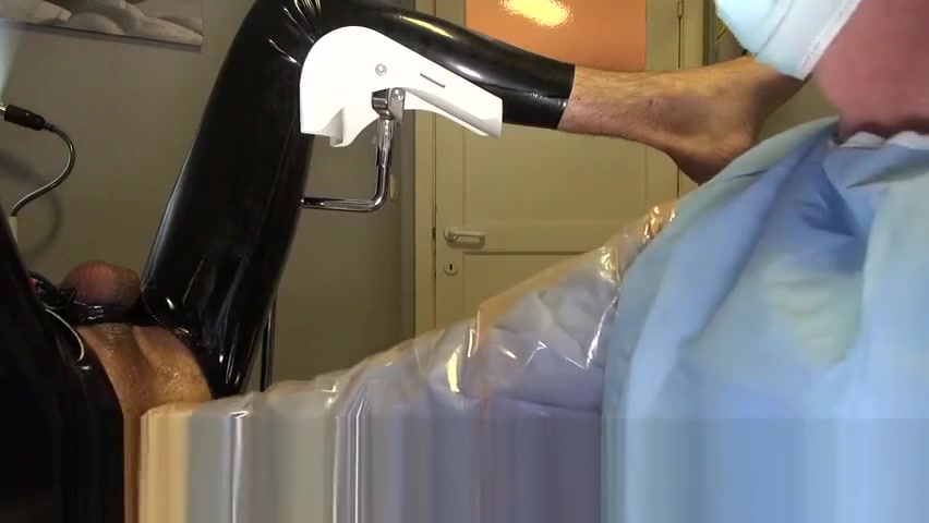 Doctor Fists and Sounds Latex Slave with Gloves in Gyno Chair