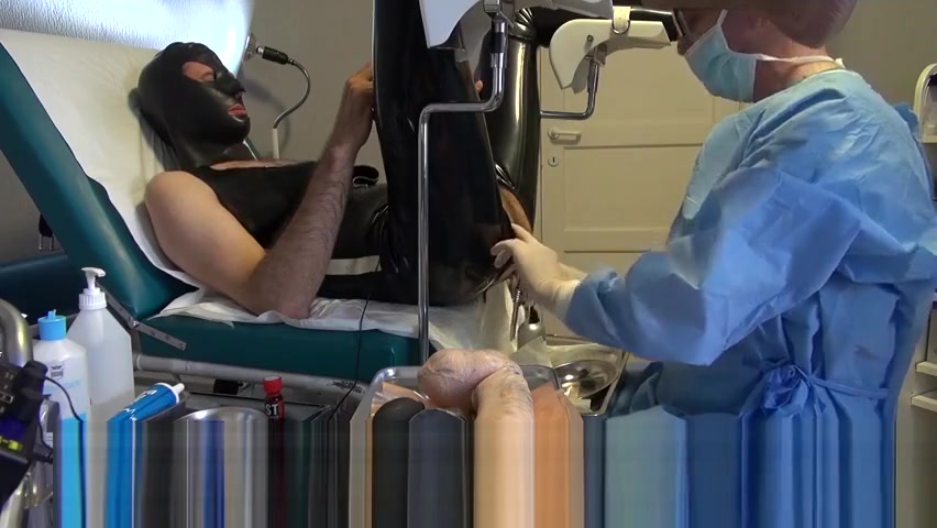 Doctor Fists and Sounds Latex Slave with Gloves in Gyno Chair