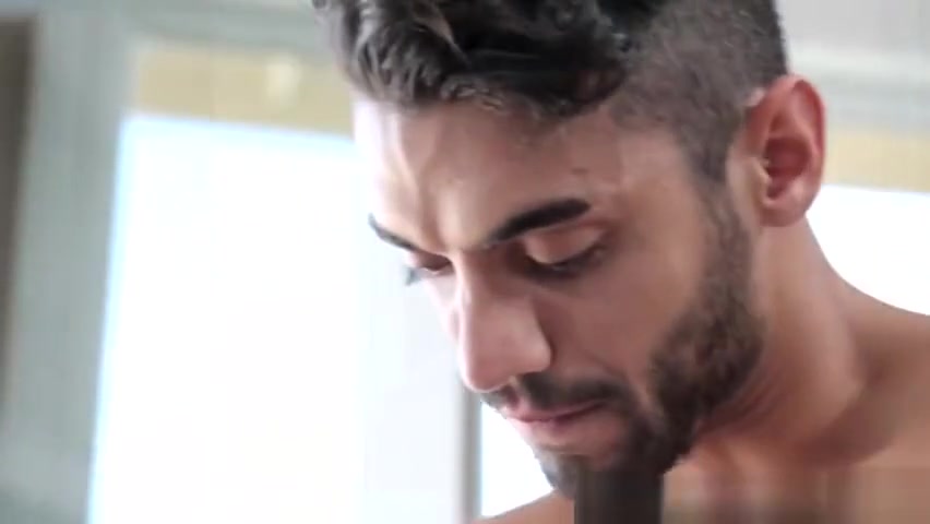 Two sexy hunks with muscles relax after massage session