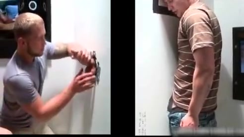 Nasty guy sucks stiff rod through gloryhole