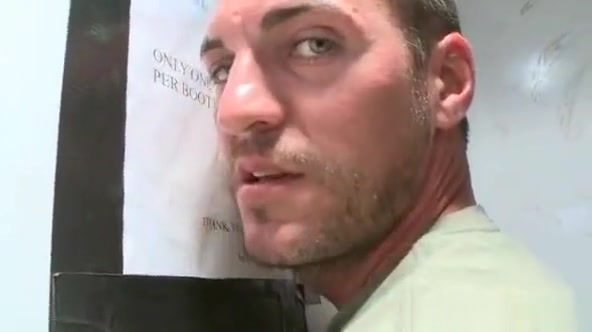 Muscled dude gets fellatio by kinky gay dude through gloryhole