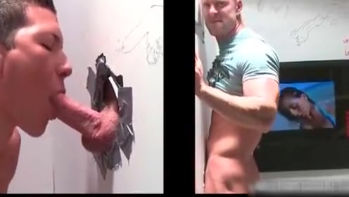 Muscled bald dude gets hot fellatio through gloryhole