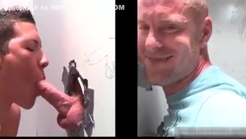 Muscled bald dude gets hot fellatio through gloryhole