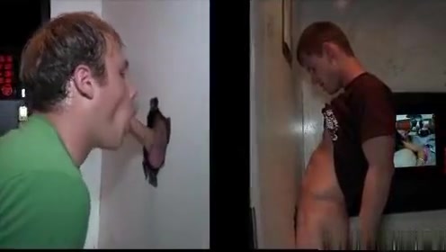 Horny gay hunk gets cock through gloryhole