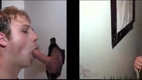 Horny gay hunk gets cock through gloryhole