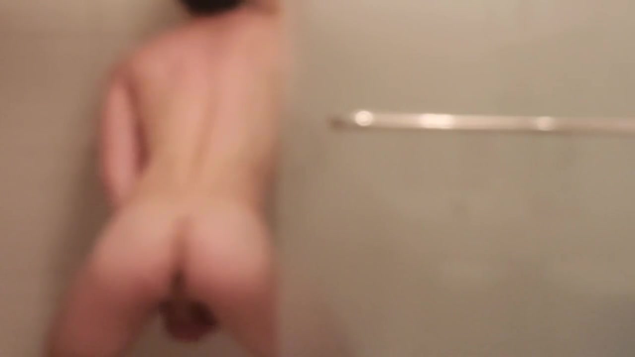 Hot and muscular guy in the shower playing with his beautiful cock and ass