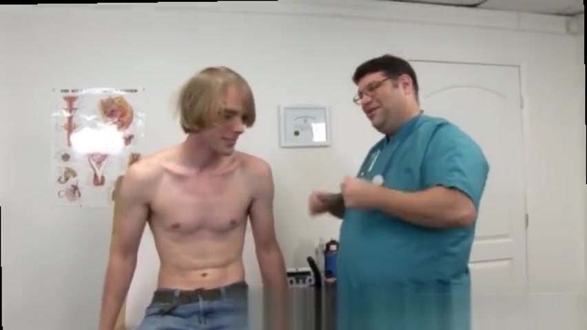Doctor examining male patients penis