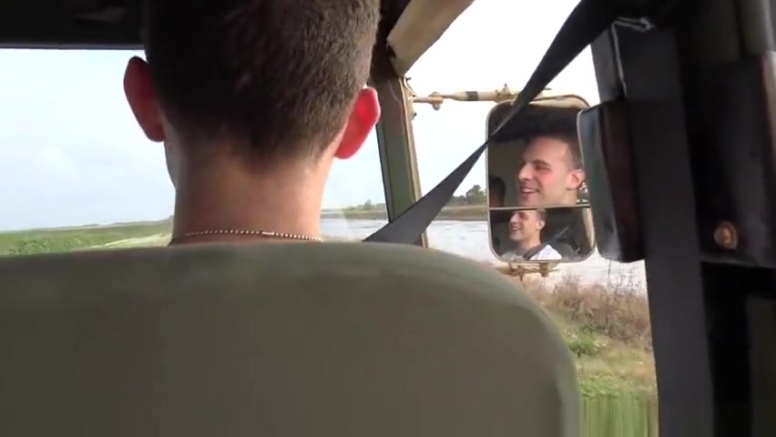 Muscular army hunks outdoors buttfuck in car
