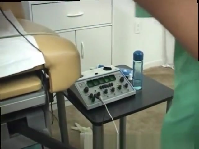 Brunette guy wanking at doctors room
