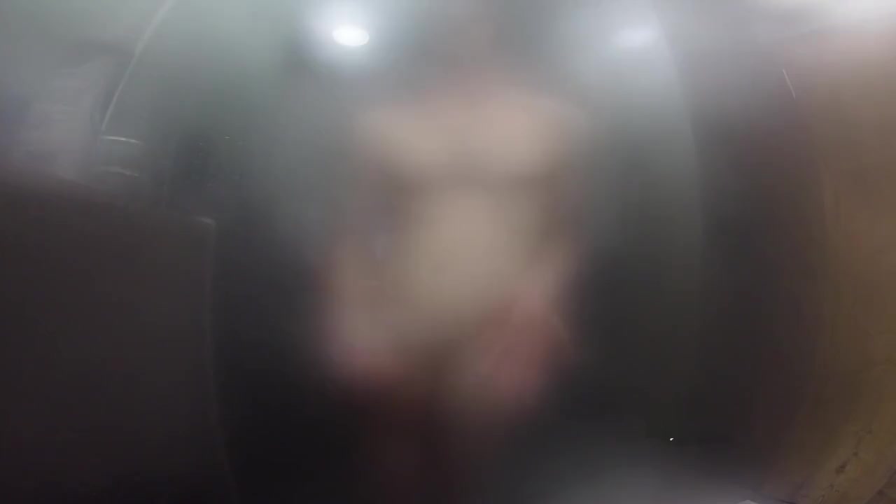 Twink jerks off and presses cock against glass in steamy shower session