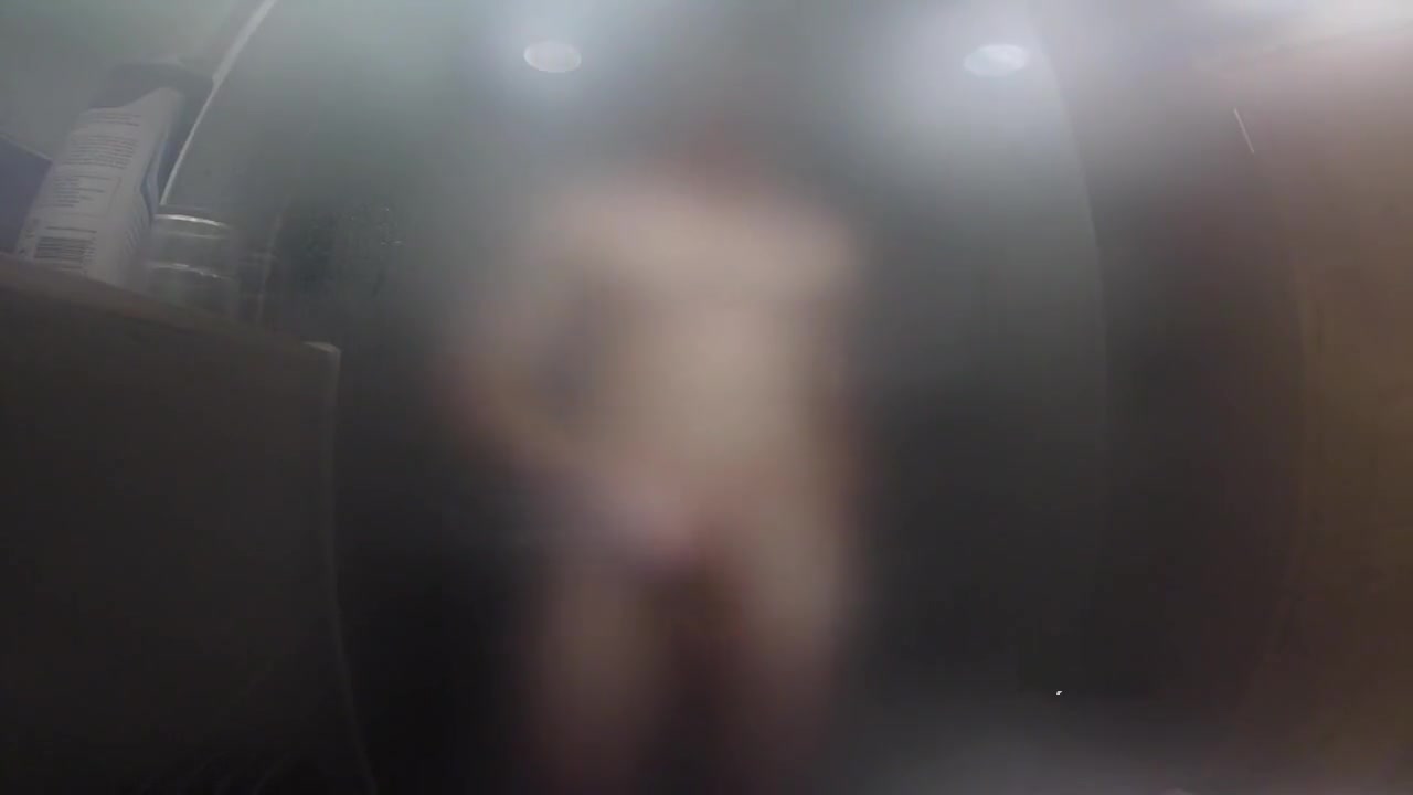 Twink jerks off and presses cock against glass in steamy shower session