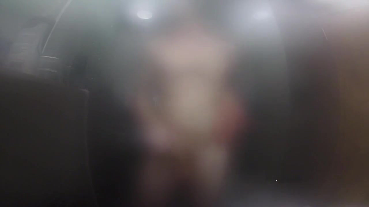 Twink jerks off and presses cock against glass in steamy shower session