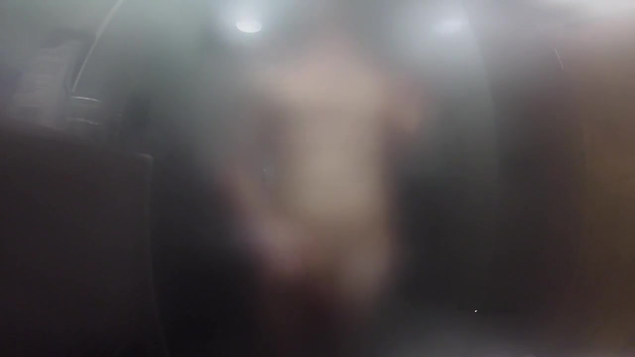 Twink jerks off and presses cock against glass in steamy shower session