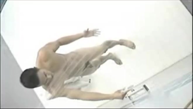 Muscular Asian marine takes a long shower