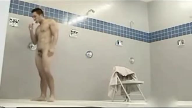 Muscular Asian marine takes a long shower