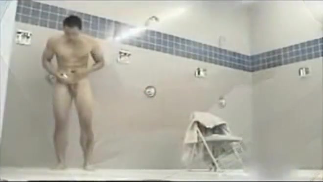 Muscular Asian marine takes a long shower