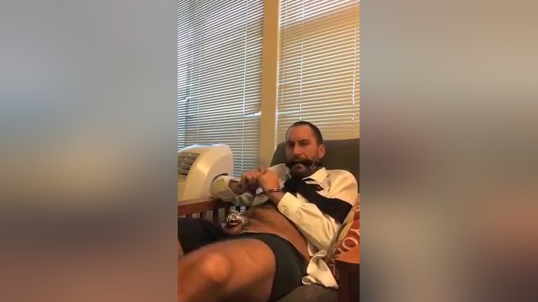 Locked Horny Officeboy Cuffed in Cute Socks