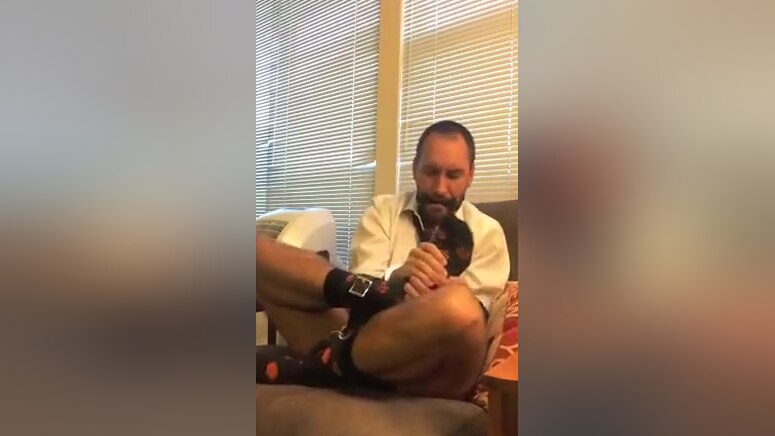Locked Horny Officeboy Cuffed in Cute Socks