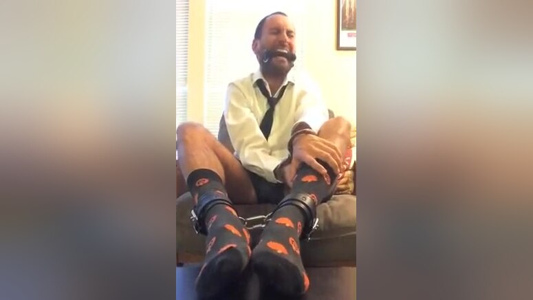 Locked Horny Officeboy Cuffed in Cute Socks