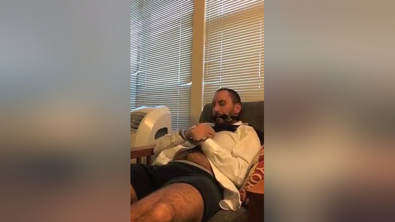 Locked Horny Officeboy Cuffed in Cute Socks