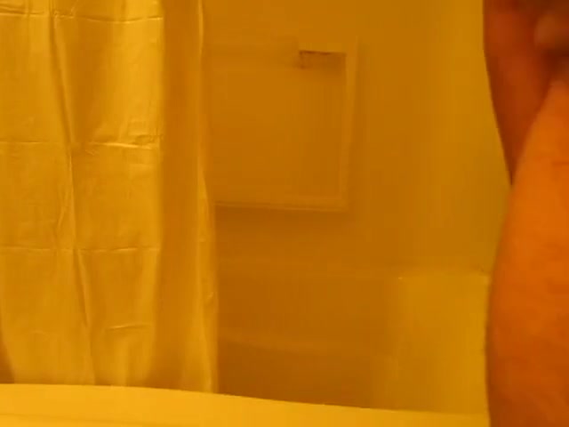 Bear taking shower