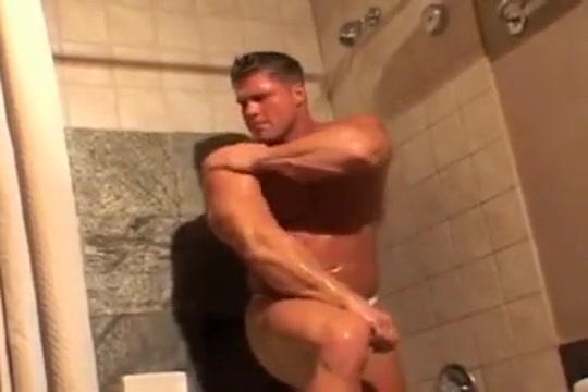 David Riley poses and takes a shower