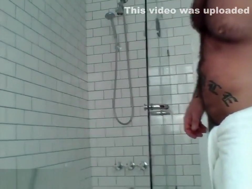 Tattooed muscle stud showers