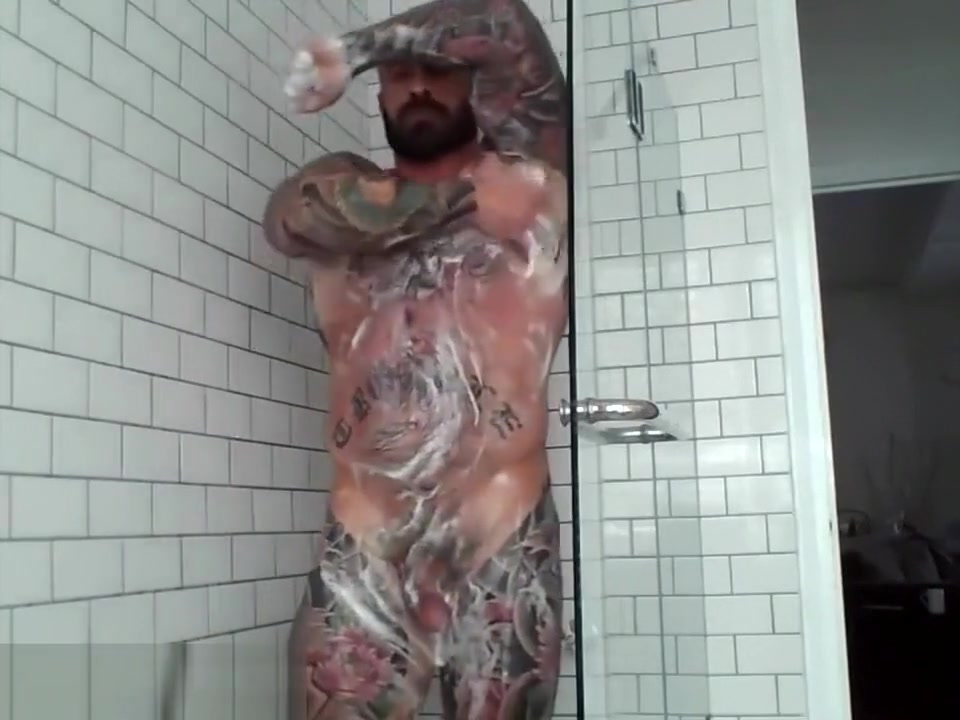 Tattooed muscle stud showers