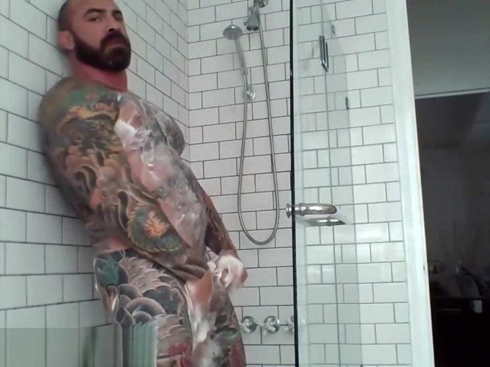 Tattooed muscle stud showers