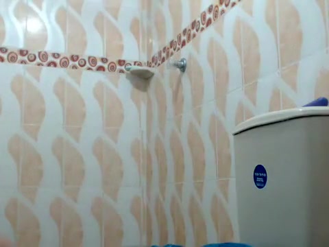 He shower and shakes his cock all smooth on the toilet