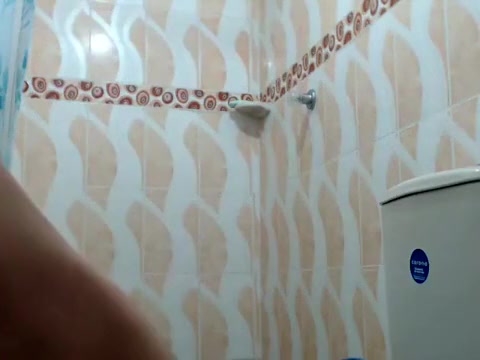He shower and shakes his cock all smooth on the toilet