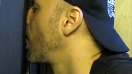 Getting the cock sucked through the gloryhole