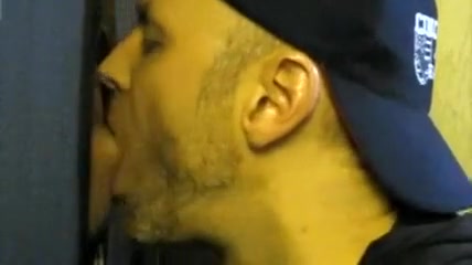 Getting the cock sucked through the gloryhole