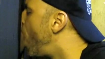 Getting the cock sucked through the gloryhole