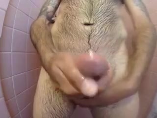 Amateur stroking big cock in shower to cumshot