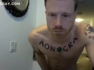 hunky tat man in shower