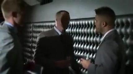 Office men help each other to get a release