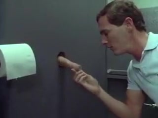 Swallowing cum through the gloryhole
