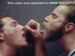 Swallowing cum through the gloryhole