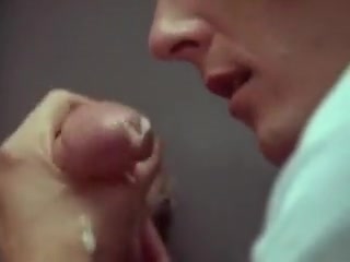 Swallowing cum through the gloryhole