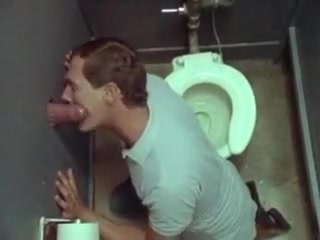 Swallowing cum through the gloryhole